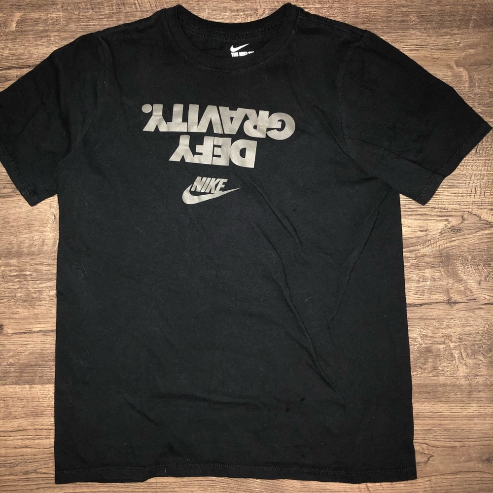“Defy Gravity.” Nike t shirt